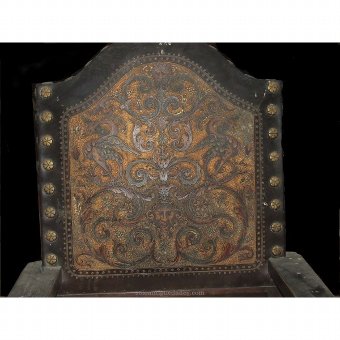 Antique Wooden armchair with leather decoration