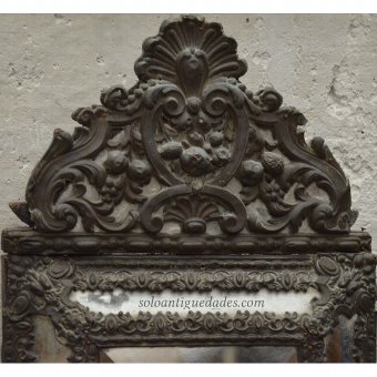 Antique Mirror with Baroque decoration in his forelock