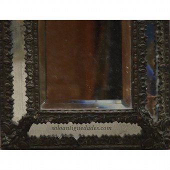 Antique Mirror with Baroque decoration in his forelock