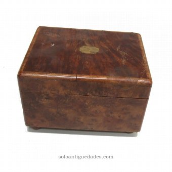 Wooden jewelry box plated with metal fixtures
