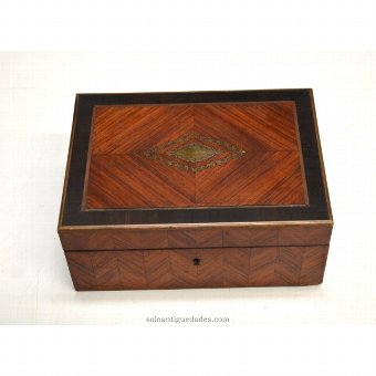 Old jewelry box decorated with marquetry Bull