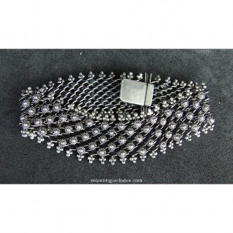 Silver bracelet in a network