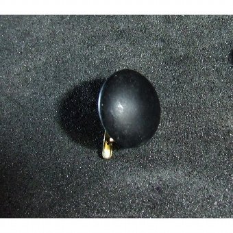Pendant with black button