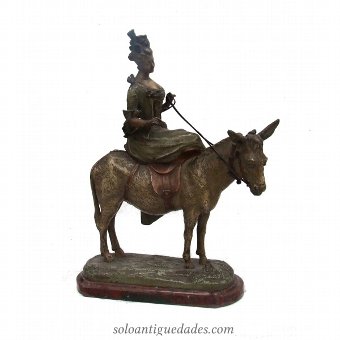 Antique Female sculpture on a donkey