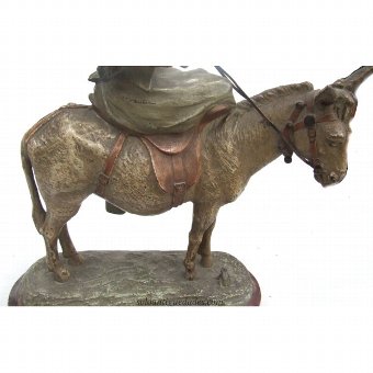 Antique Female sculpture on a donkey