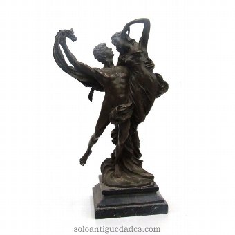 Bronze sculpture of couple dancing