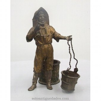 Metal sculpture fisherman