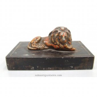 Iron sculpture lion lying