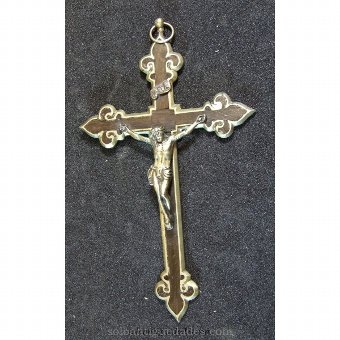 Wooden crucifix framed in silver