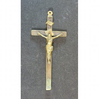 Wooden crucifix framed in bronze