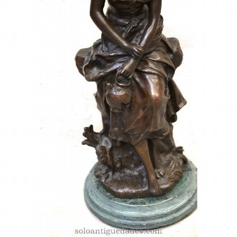 Antique Female sculpture with jug