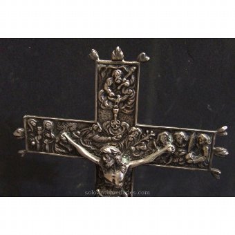 Antique Silver crucifix decorated with reliefs
