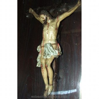 Antique Showcase with Christ crucified