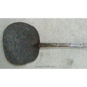 Antique Shovel with geometric kitchen in the center