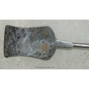 Antique Shovel narrowing old kitchen with its center