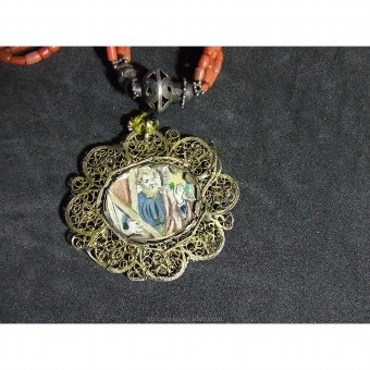 Antique Necklace with coral beads and religious medals