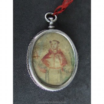 Antique Medallion locket type. Image of The Virgin