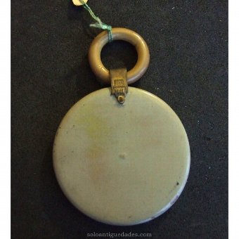 Antique Bakelite medallion with circular