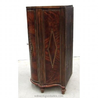 Antique Corner cabinet decorated with rhomboid