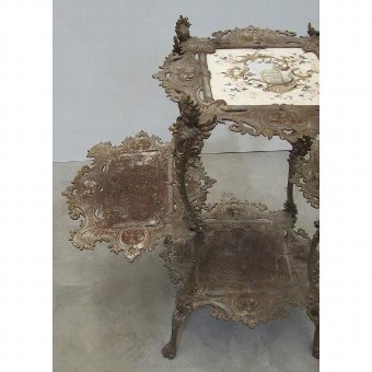 Antique Side table decorated with plant
