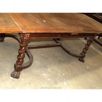 Antique Dining table legs terminating in claw