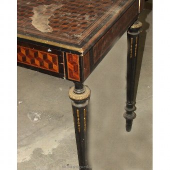 Antique Empire style table decorated with inlay