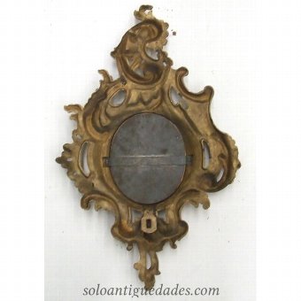 Antique Cornucopia with circular mirror and crest decorated with plant