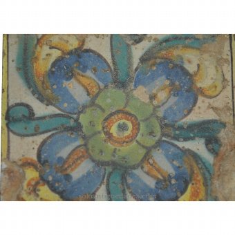 Antique Glazed tile decorated with a flower