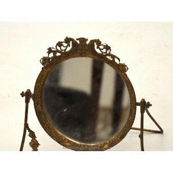 Antique Pivoting Vanity mirror surmounted by figures mitol