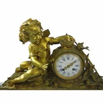 Antique Desk clock with cupid figure