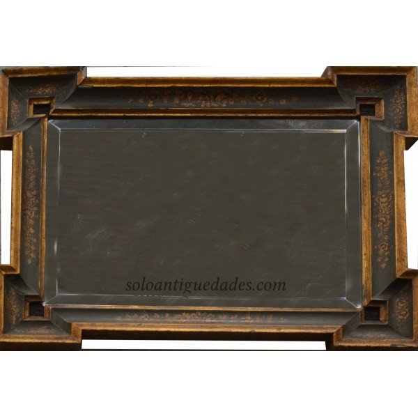 Antique Wall mirror with lugs at the corners of the frame