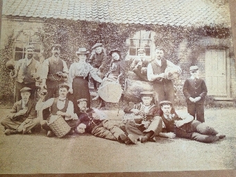 Old photograph of Norfolk farm workers from the Holkam estate