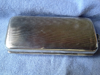 Antique Silver, gold, and amber cigarette holder and case 