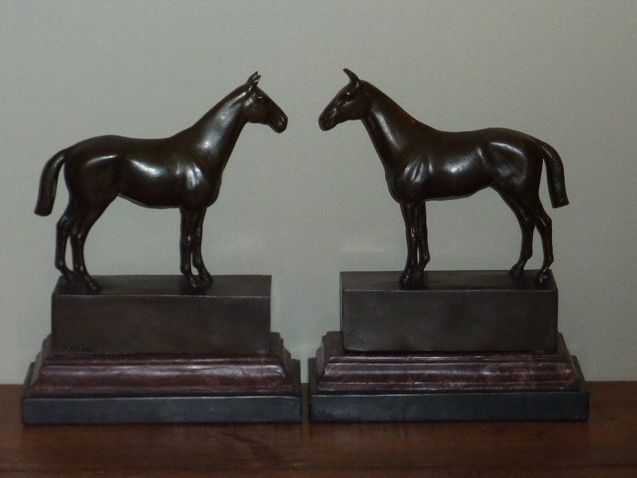 Antique Matching pair of horse bronzes 
