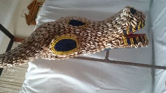 Antique Cabeza real africana Caurís