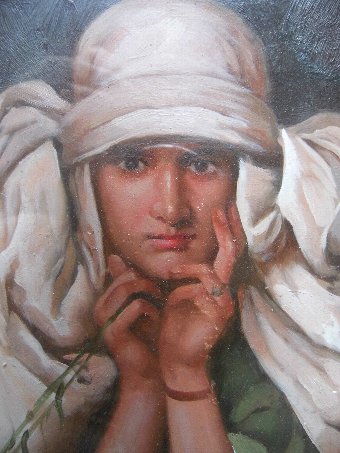 Antique A giltframed oil painting portrait of an orientalist woman with flower