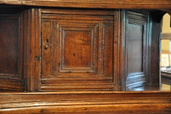 A FINE 17TH CENTURY OAK LIVERY CUPBOARD OF SMALL PROPORTIONS