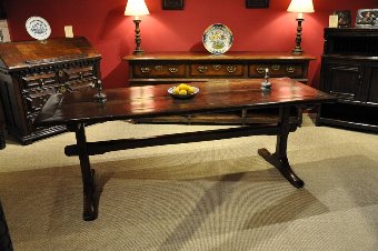 A LATE 17TH CENTURY ENGLISH OAK TRESTLE TABLE. CIRCA 1680.