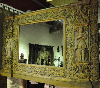 Antique AN EARLY 17TH CENTURY NORTH ITALIAN CARVED, GILDED AND POLYCHROMED MIRROR. CIRCA 1620