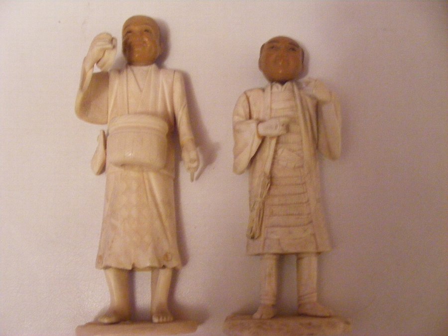 carved ivory okimono figures pair
