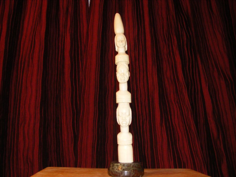 carved ivory large tusk on stand