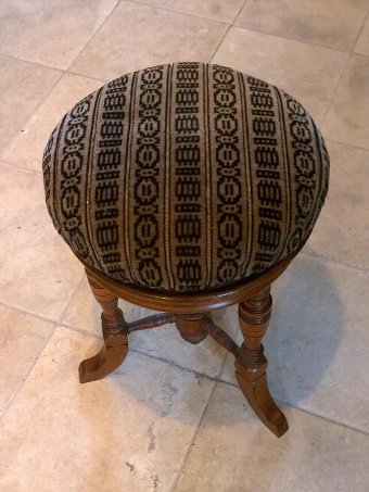 Antique walnut revolving stool