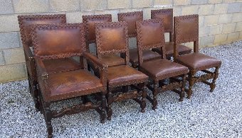 Antique Set of 8 oak dining chairs in Jacobean Style.Very fashionable worn leather. 6 Stand chairs and two carvers
