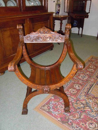 Antique Carved armchair in solid oak called 