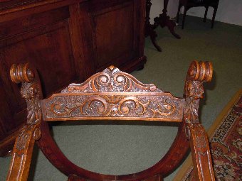 Antique Carved armchair in solid oak called 