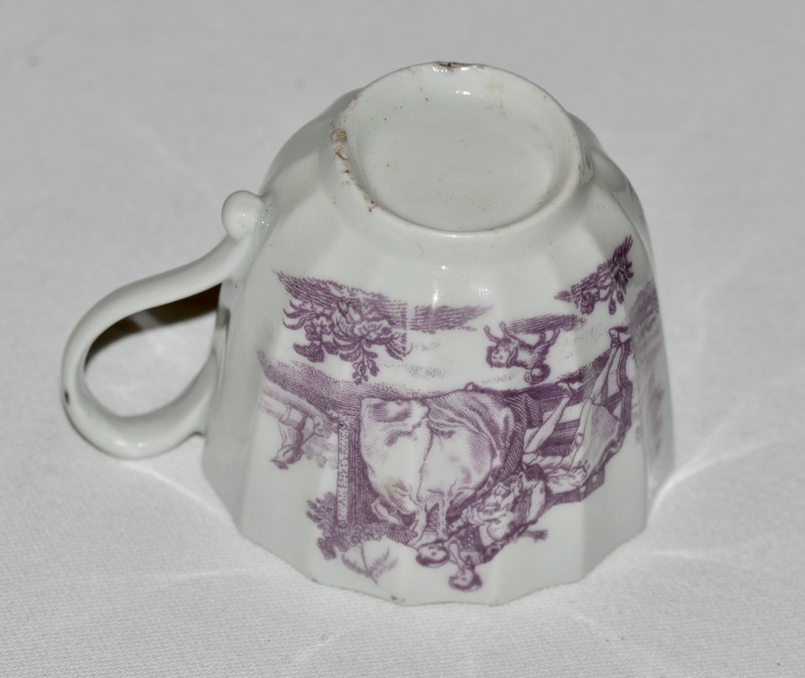 Antique A Worcester L'Amour pattern porcelain fluted coffee cup. c1770