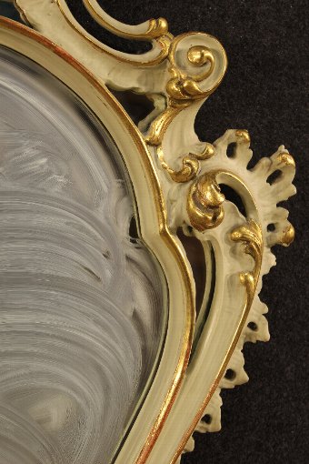 Antique Venetian lacquered and gilded mirror of the 20th century