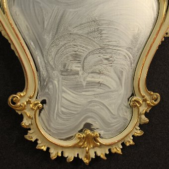 Antique Venetian lacquered and gilded mirror of the 20th century