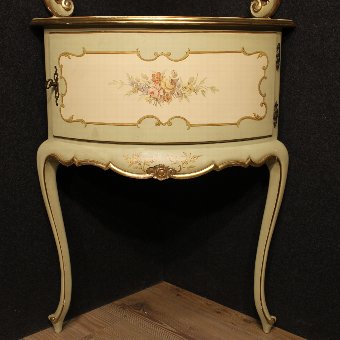 Antique Italian lacquered and gilded corner cupboard of the 20th century