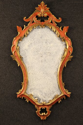 Antique Gilded and painted Florentine mirror of the 20th century
